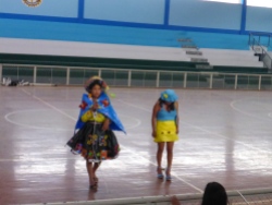 Two high school students from Yuracoto in costumes made of plastic bags